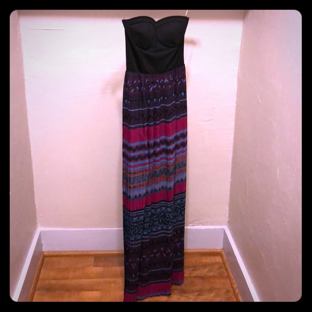 A floor length strapless party dress.